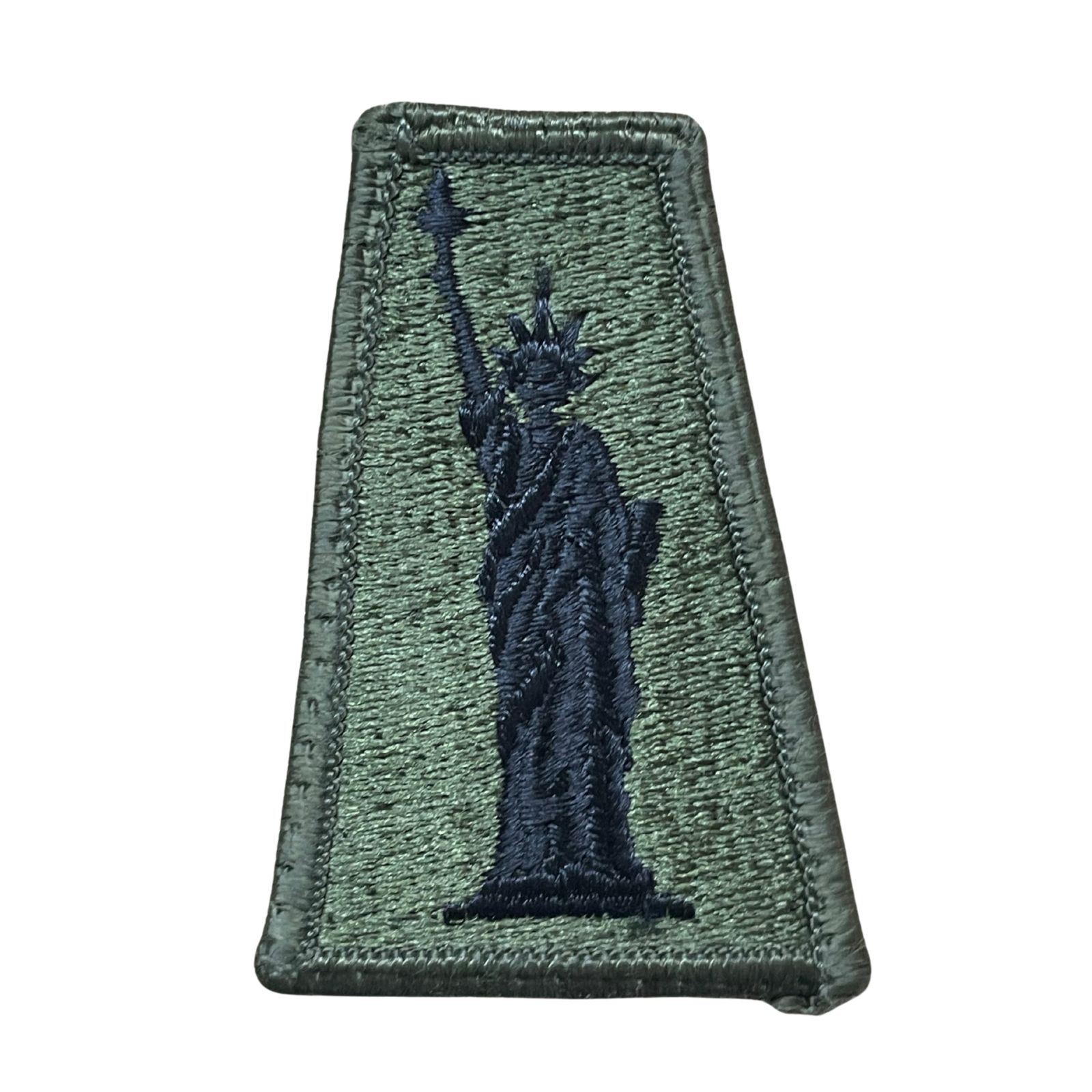 US Amerikai 77th Sustainment Brigade felvarró, eredeti csökkentett láthatóságú