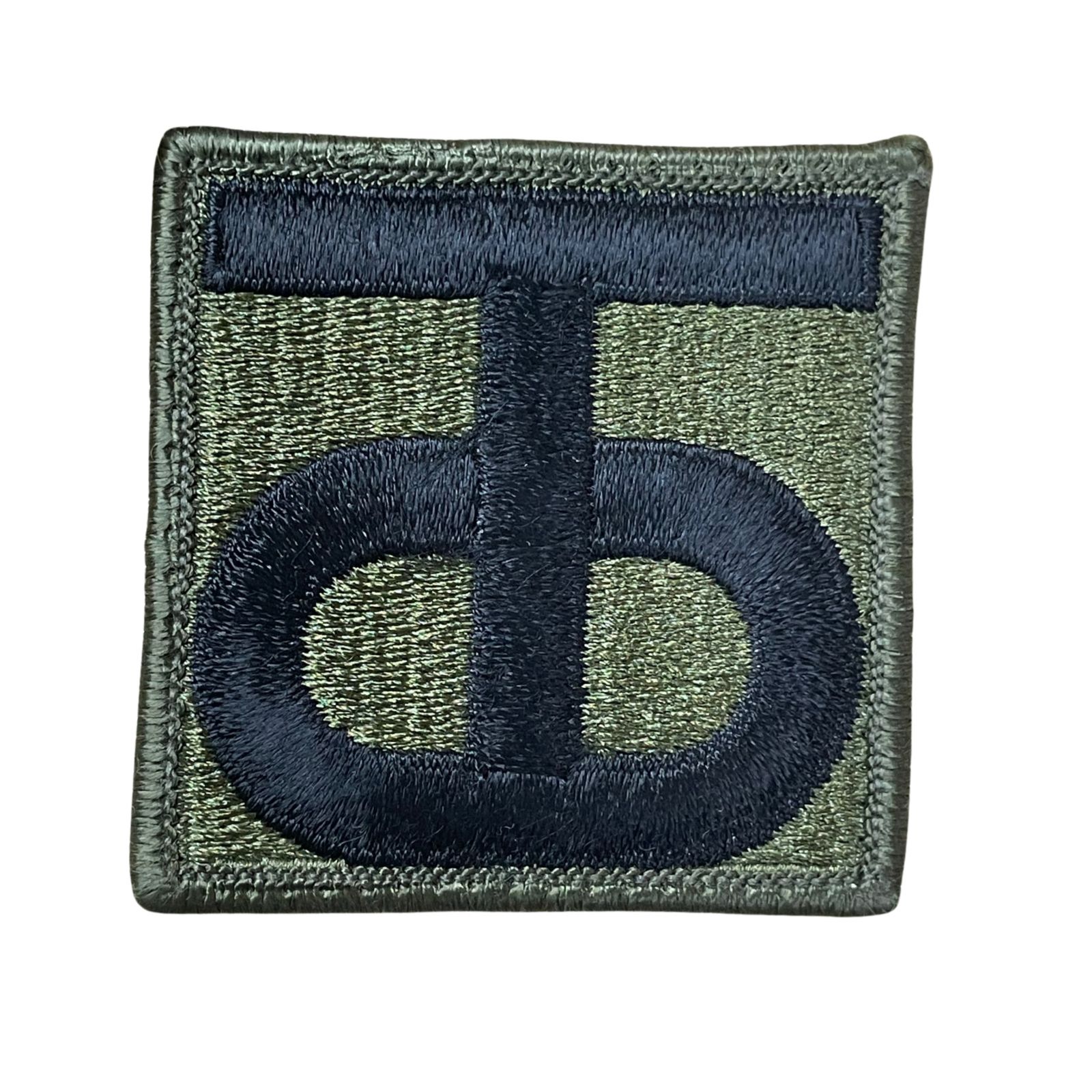 US Amerikai 90. Gyalogoshadosztály felvarró, eredeti csökkentett láthatóságú